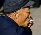 Chinese man smoking a cigarette