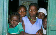 Five Nigerian girls gather in doorway
