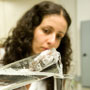 Female researcher works with liquids in lab