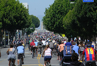 large group of people bicycling in the street in Los Angeles for CicLAvia
