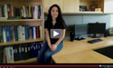 Webcast screenshot of woman speaking in office