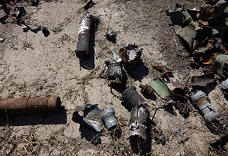 Unexploded ordnance lies in farmland in Yahidne, Ukraine.