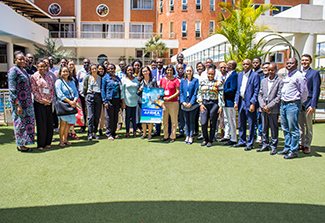 Attendees of the December 2022 State of Data Science for Health in Africa Writing Project in Nairobi, Kenya, pose for a group photo.