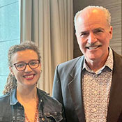 Acting Fogarty Director Peter Kilmarx (right) with Alonya Mazhanaya (left) smiling in Warsaw, Poland in June 2023