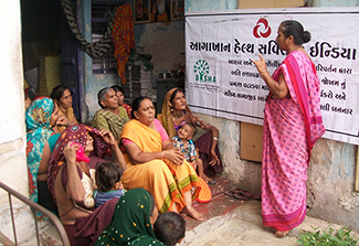 Participants learn about a study taking place at the Centre for Chronic Disease Control in India, one of the COALESCE partners