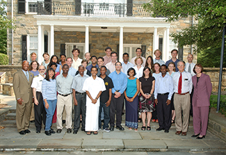 Fellows pose with Fogarty and NIH staff at orientation in 2004.