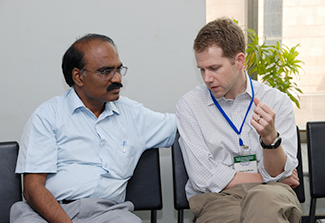 Dr. Mark Huffman talks with his mentor Dr. Dorairaj Prabhakaran