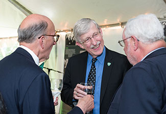 Roger Glass, Francis Collins and Warren Johnson speak together