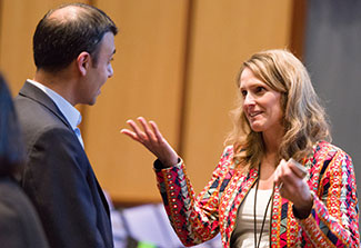 Amit Mistry and Shelli Avenevoli speak in the auditorium