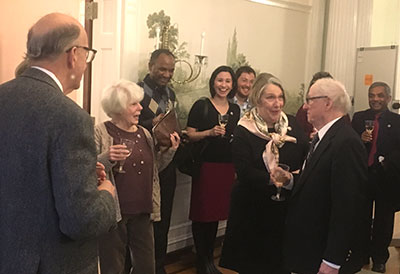 Dr. Ken Bridbord celebrates receiving a Fogarty lifetime achievement award at a reception with colleauges and family.