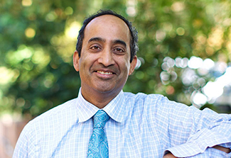 Headshot of Dr. Manjoj Menon