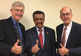 Francis Collins, Teros Adhanom Ghebreyesus and Roger Glass give a thumbs-up to the camera