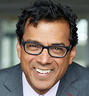 Headshot of Dr. Atul Gawande, who is smiling