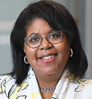 Headshot of Dr. Jennifer Webster-Cyriaque, who is smiling