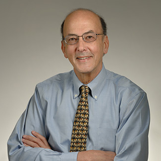 The photo shows Dr. Roger Glass