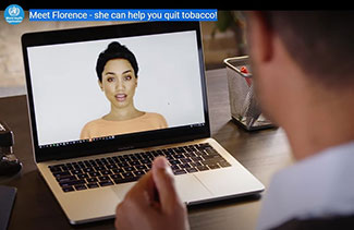 Person interacts with a digital health worker on a laptop screen.