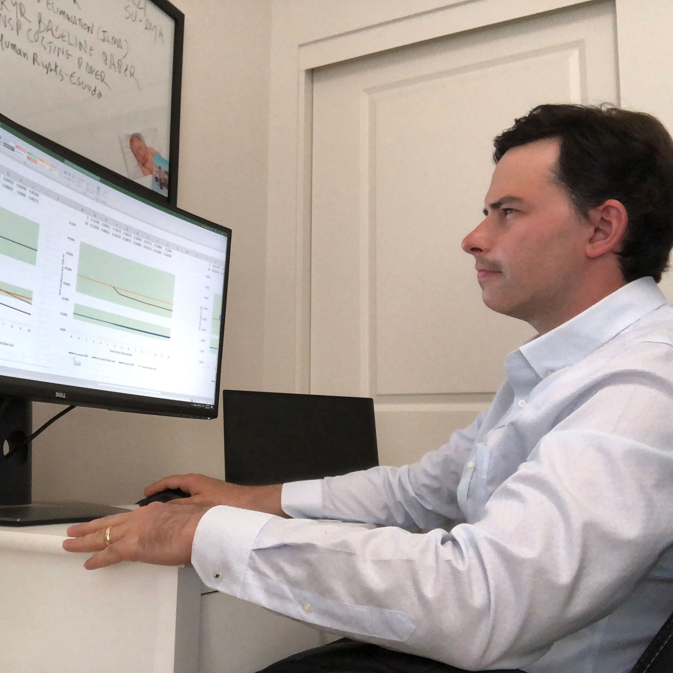 Dr Cepeda works with data on his computer screen