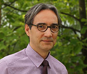 Outdoor headshot of Dr. John Reeder.