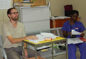 Andrew Gardner and medical worker in the hospital in Ghana