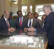 Dr Glass, Dr Gibbons, Tanzania President Jakaya Kikwete, Dr Collins and others view NIH model in clinical center lobby