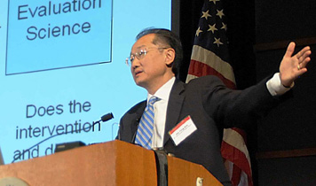 Dr. Jim Young Kim speaks from behind a podium.