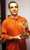Photo: Dr. Wasim Maziak holding his award
