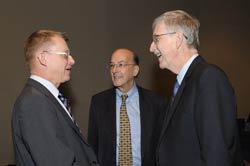 Dr Rosling, left, speaks with Dr Francis Collins and Dr Roger I Glass
