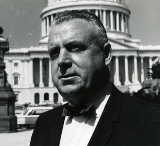 John E. Fogarty standing outside the Capitol building.