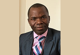 Headshot of Dr. Lloyd Mulenga.
