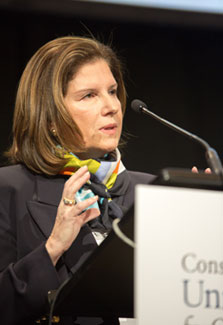 Foundation for the NIH President Dr Maria Freire speaks at a podium during the CUGH 2016 conference