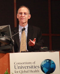 Dr. Ezekiel Emanuel speaks into a microphone at a podium.