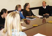 PHOTO: Dr Roger Glass with students in classroom